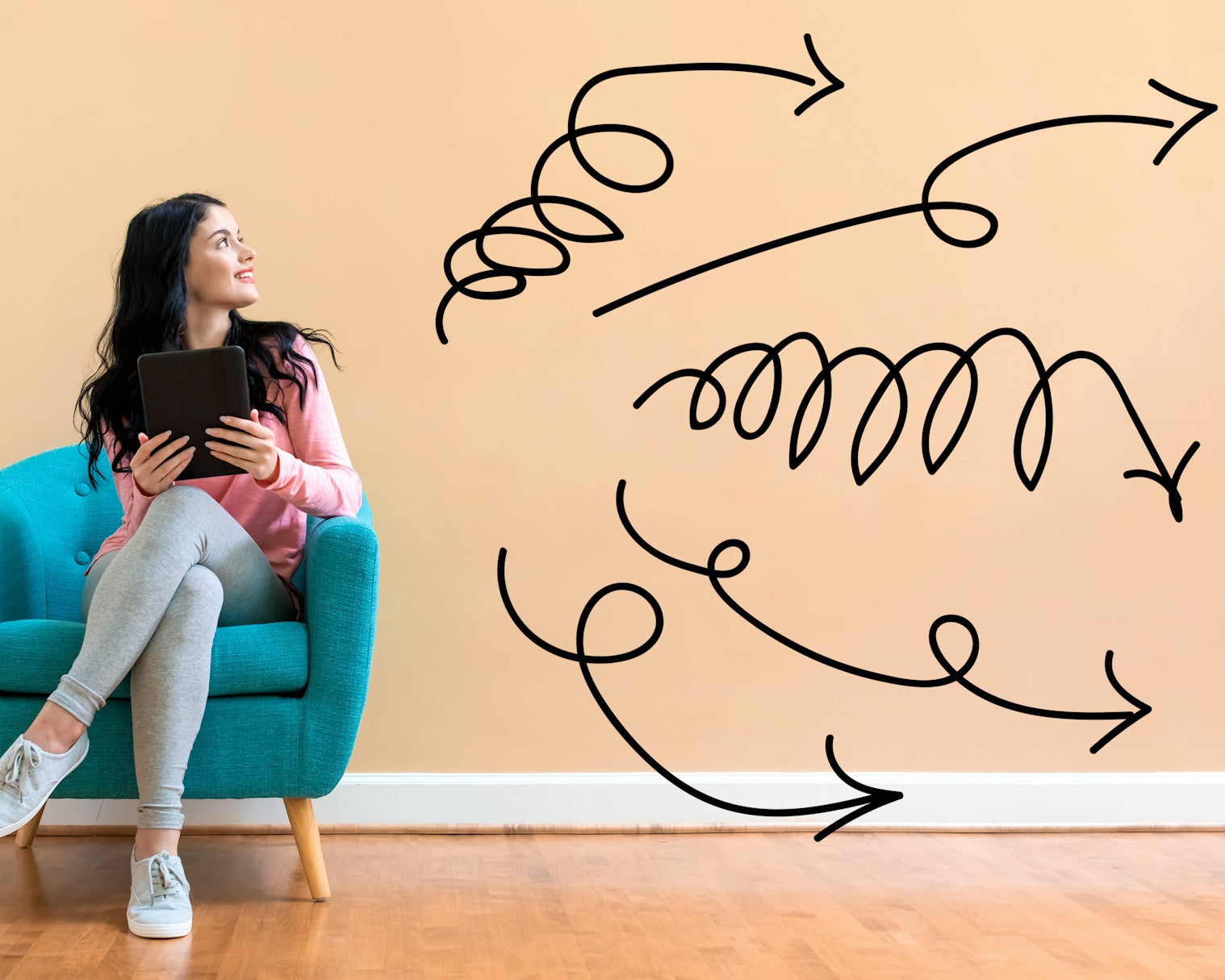 woman sitting in chair with arrow clipart drawings